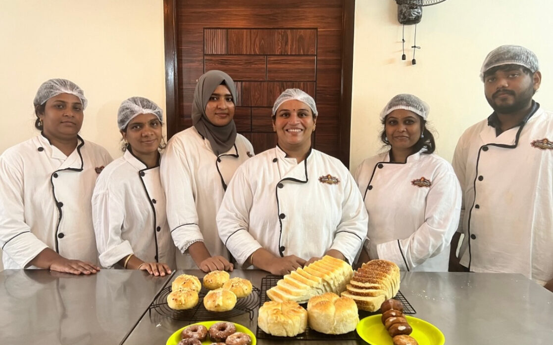 Student decorating a cake at Hazee Delights baking class in Chennai